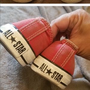 Red Converse low tops